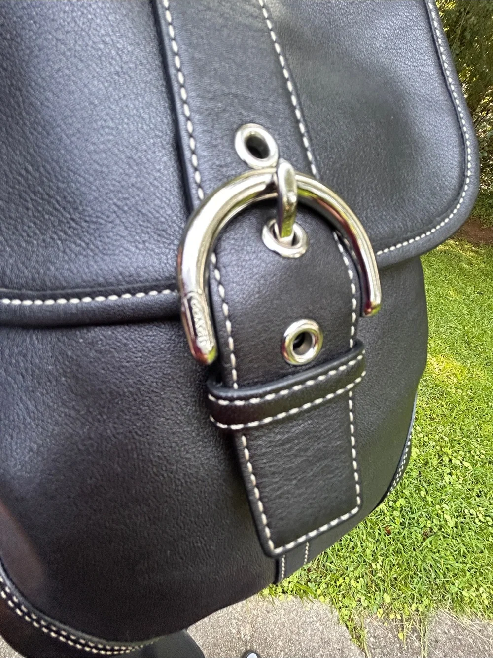 Classic Black Leather Backpack with Silver Buckle